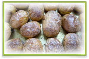 Recipe for baked potatoes on a baking tray